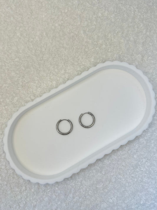 Boucle d'oreille ronde argentée